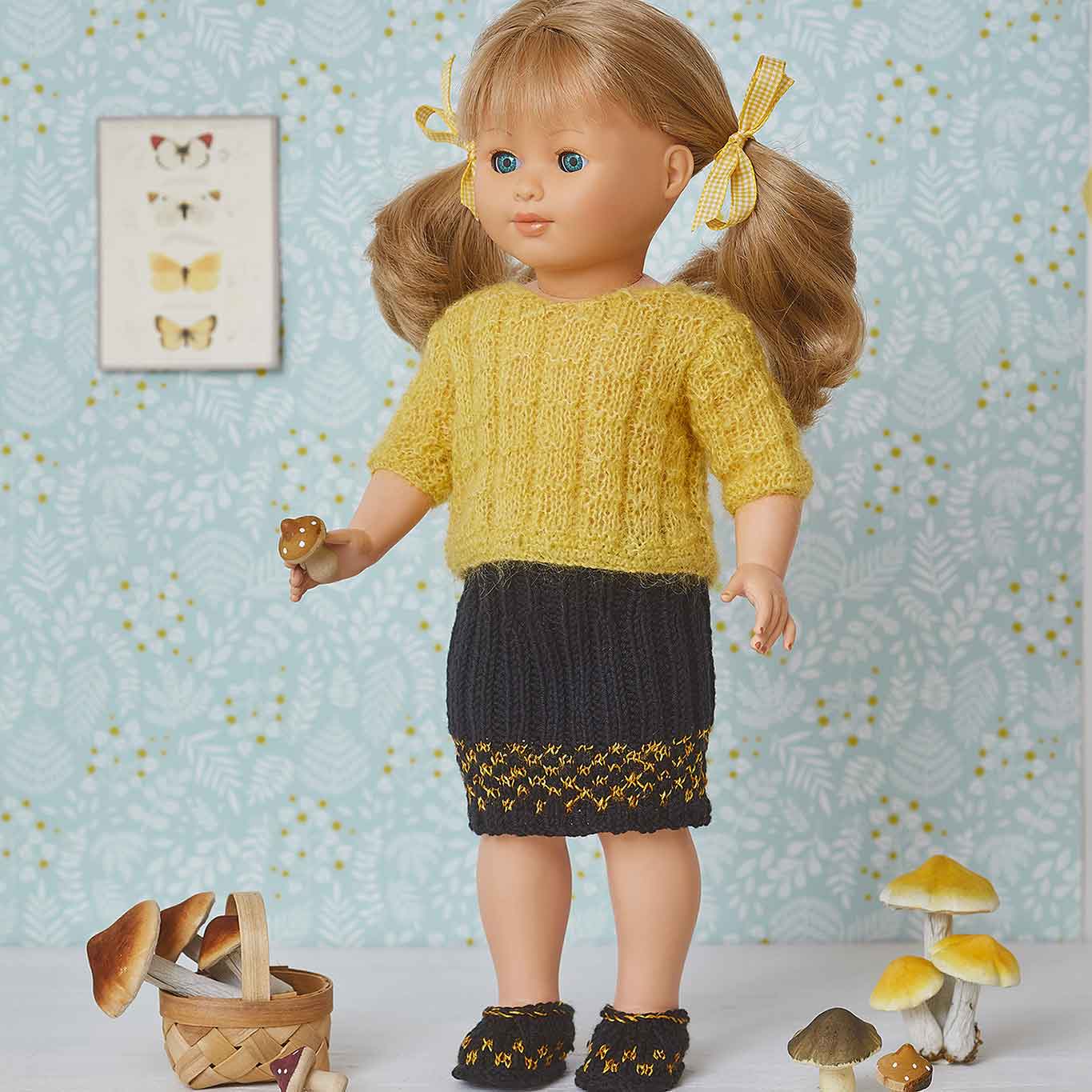 Tricoter une robe pour poupée - Une pelote et deux aiguilles